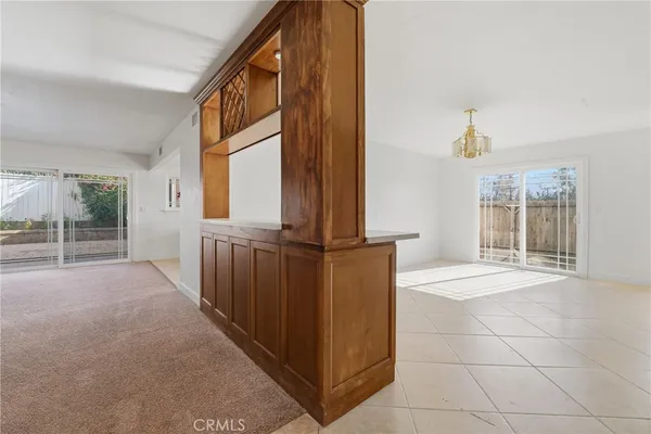 a kitchen with stainless steel appliances a sink and a refrigerator