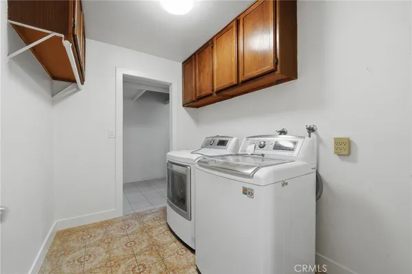 a bathroom with a toilet and a bathtub