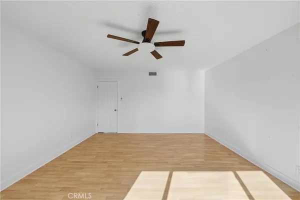 an aerial view of a house with outdoor space