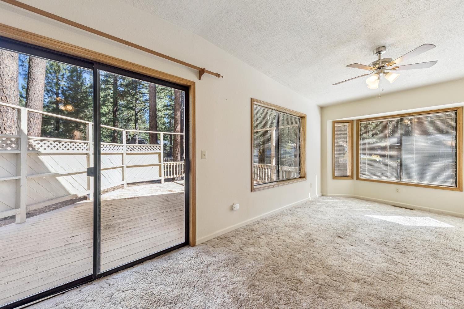 2699 Elwood Avenue South Lake Tahoe, CA 96150 - Photo 4 of 27 a view of an empty room with a window