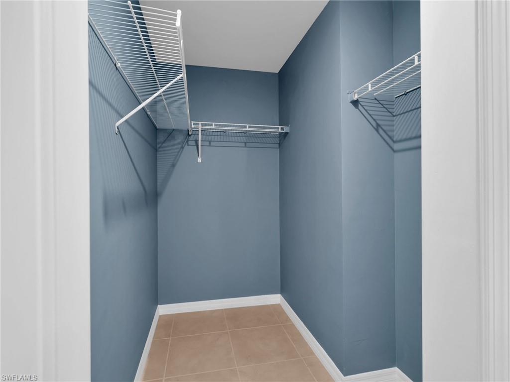 731 Hadley Place West Naples, FL 34104 - Photo 24 of 30 Large Primary Bathroom Walk-In Closet