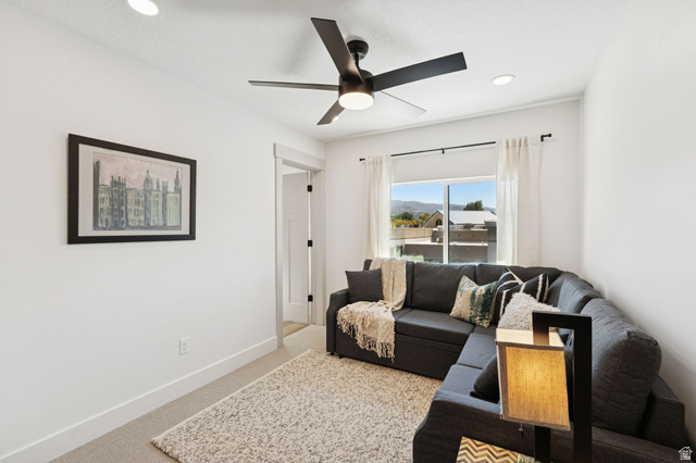 51 East 200 North, Unit 3 Bountiful, UT 84010 - Photo 15 of 27 Living area with light carpet, recessed lighting, and a ceiling fan