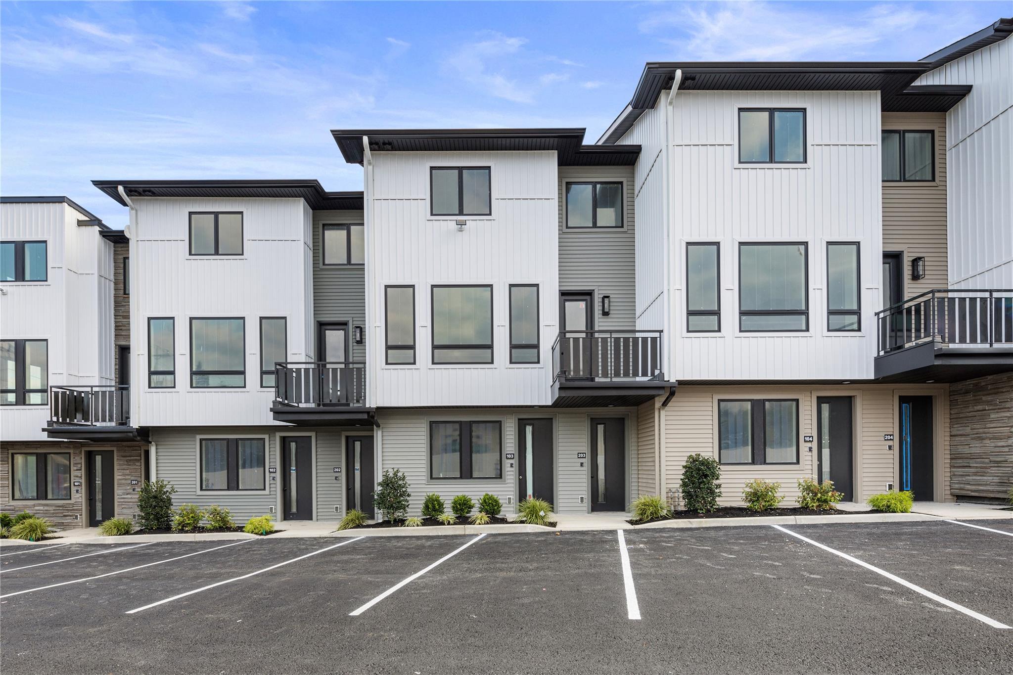 a front view of a building with a street