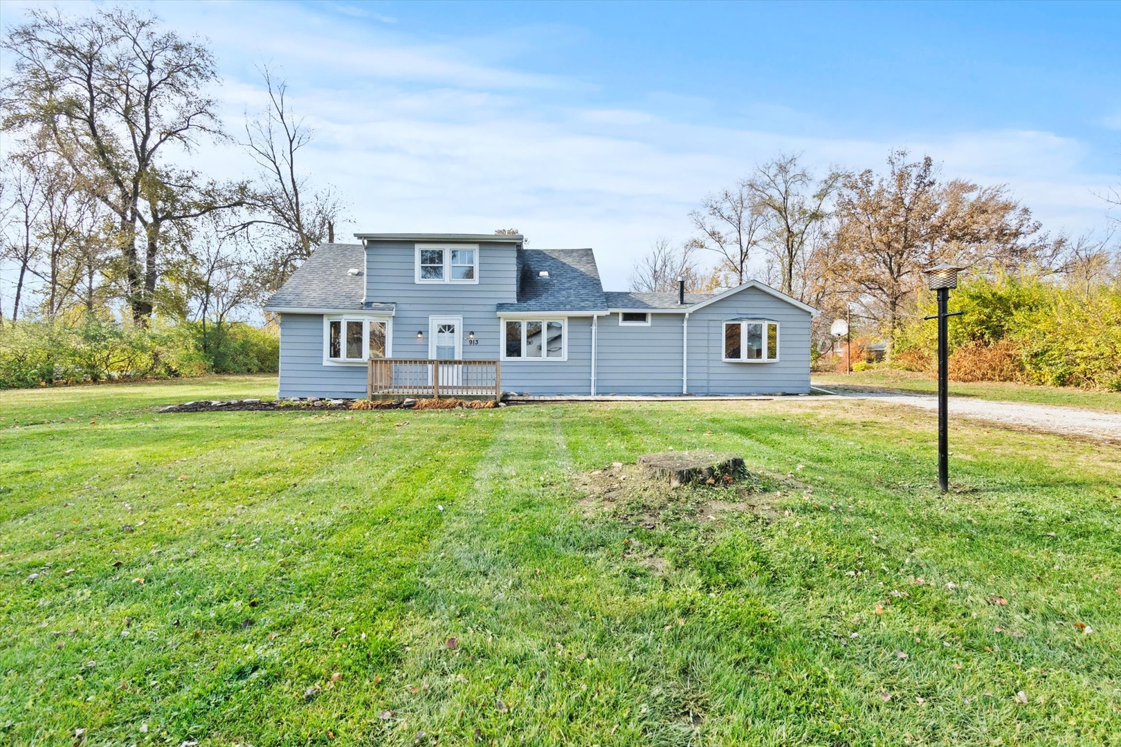 913 Ogden Road New Lenox, IL 60451 - Photo 3 of 41 a front view of house with yard and trees