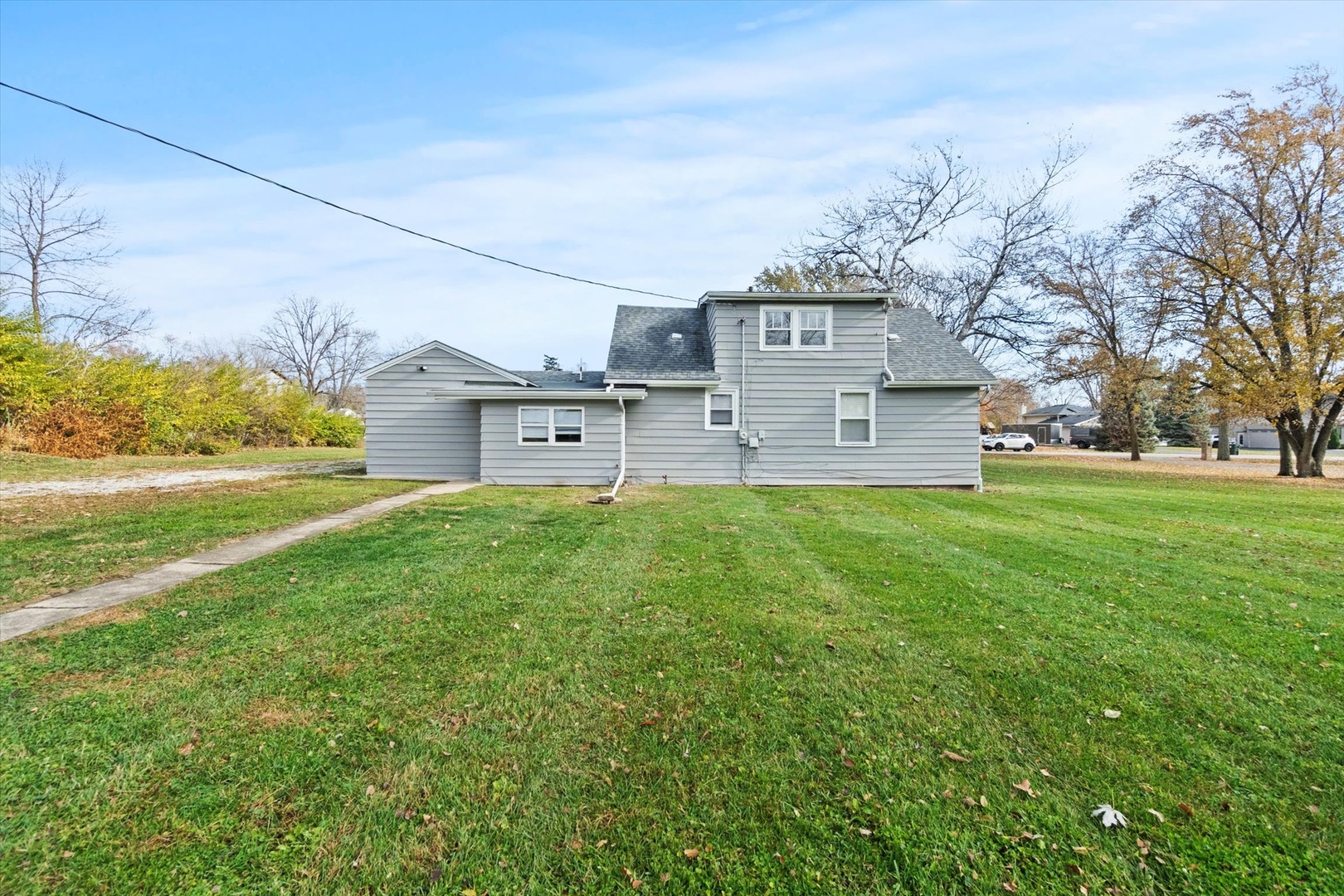 913 Ogden Road New Lenox, IL 60451 - Photo 31 of 41 a view of a house with a big yard and large tree