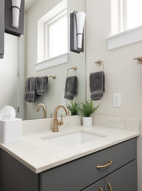 2300 Enfield Road, Unit 303 Austin, TX 78703 - Photo 24 of 38 a bathroom with a sink and a mirror