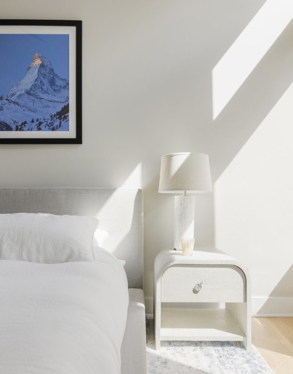 2300 Enfield Road, Unit 303 Austin, TX 78703 - Photo 26 of 38 a bedroom with a bed and a painting on the wall