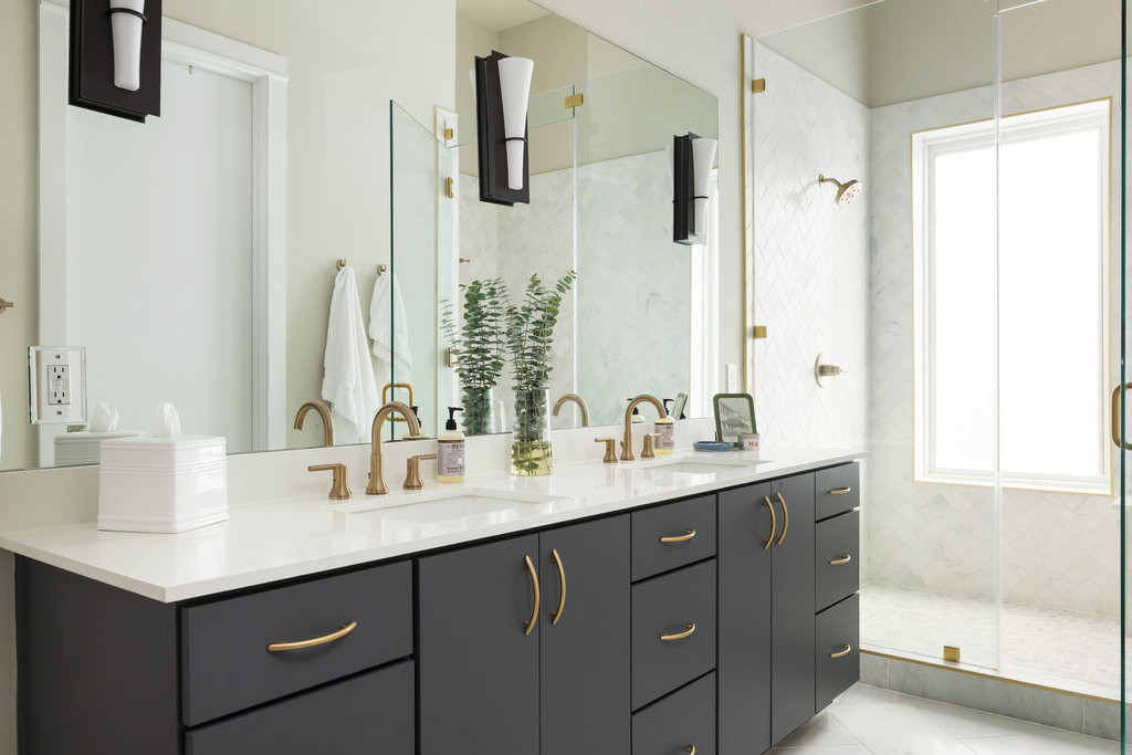 2300 Enfield Road, Unit 303 Austin, TX 78703 - Photo 27 of 38 a bathroom with a double vanity sink and mirror