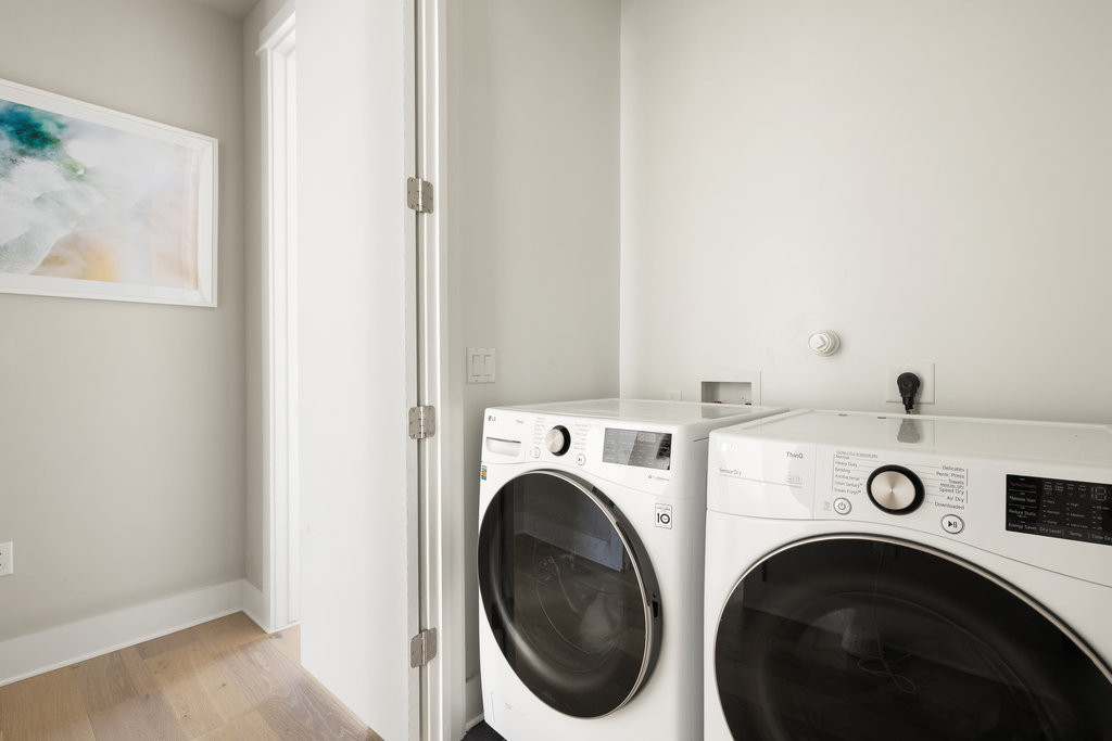 2300 Enfield Road, Unit 303 Austin, TX 78703 - Photo 30 of 38 a view of washer and dryer in a utility room