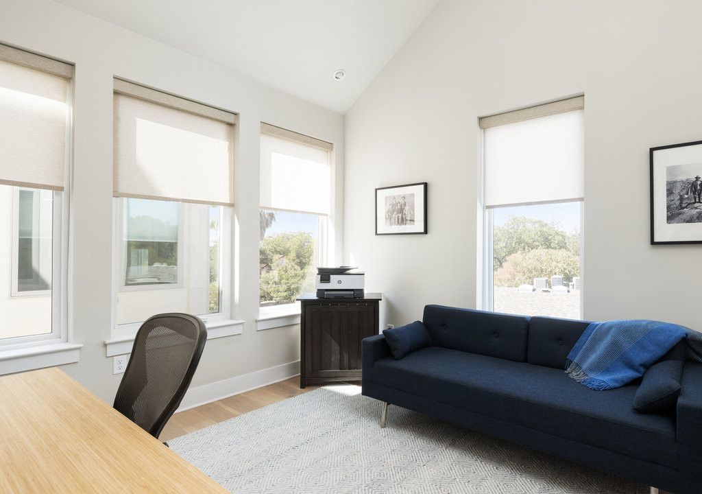 2300 Enfield Road, Unit 303 Austin, TX 78703 - Photo 32 of 38 a living room with furniture and a large window