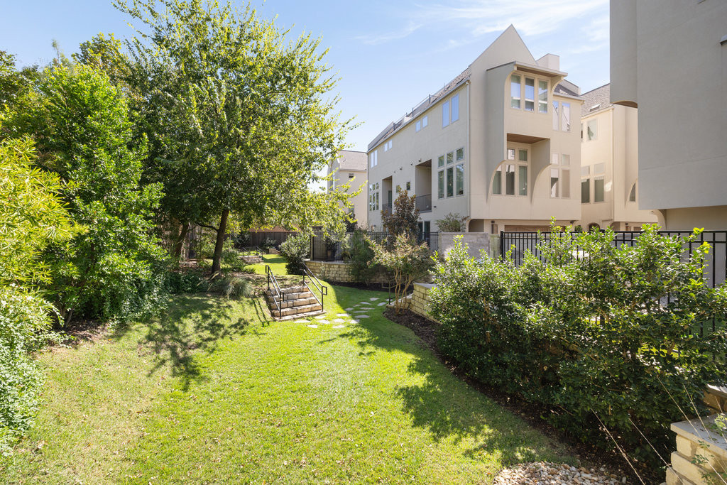 2300 Enfield Road, Unit 303 Austin, TX 78703 - Photo 36 of 38 a view of swimming pool with lawn chairs and plants