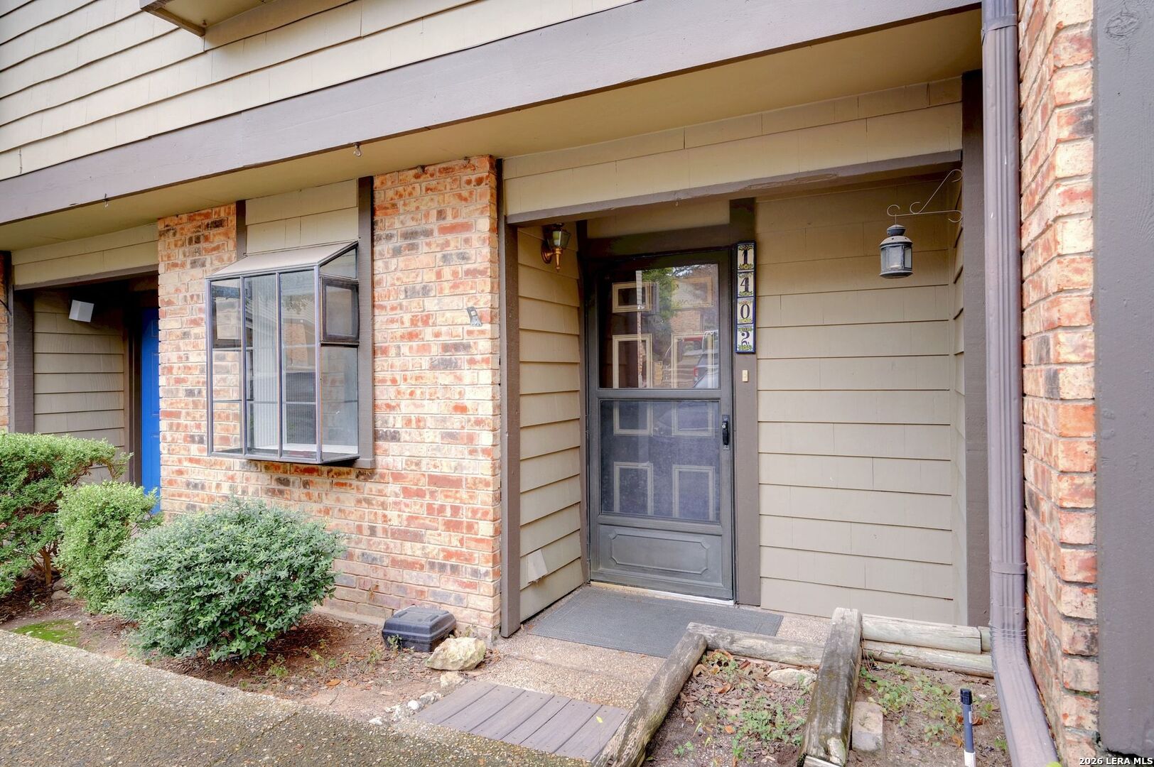 11815 Vance Jackson Road, Unit 1402 San Antonio, TX 78230 - Photo 1 of 29 a front view of a house