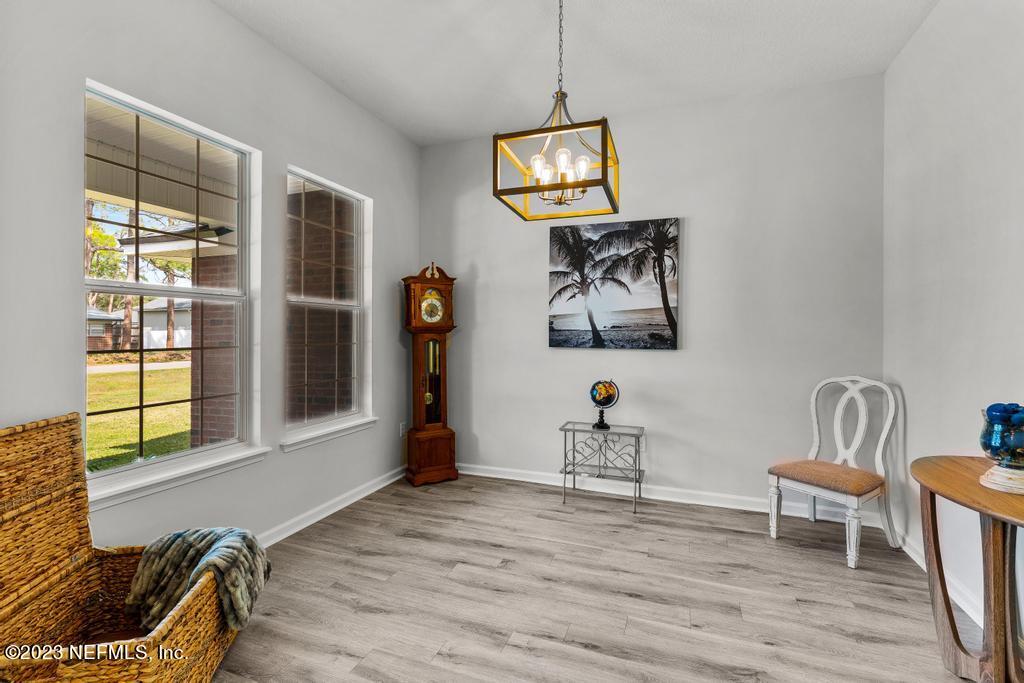 54150 Deerfield Country Club Road Callahan, FL 32011 - Photo 6 of 37 a view of a livingroom with furniture and windows