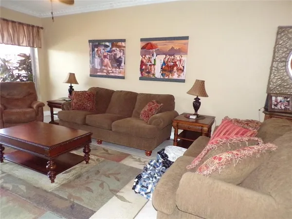 a living room with furniture and a couch