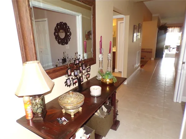 a large white kitchen with a large window