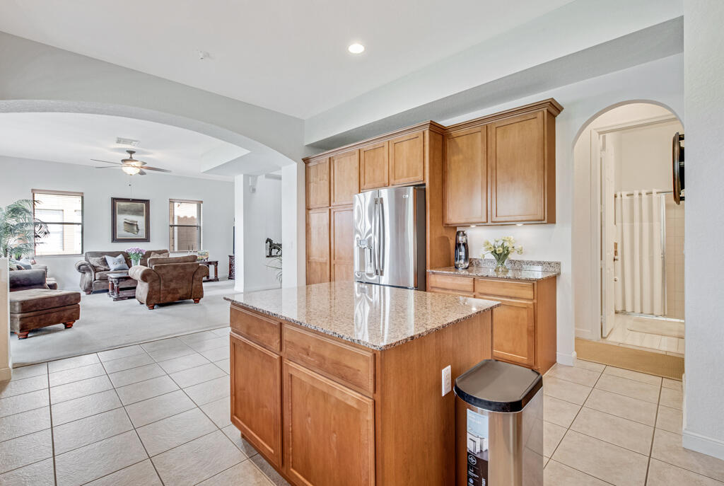 514 Cresta Circle West Palm Beach, FL 33413 - Photo 22 of 74 a kitchen with stainless steel appliances granite countertop a refrigerator a stove and a sink with granite countertops