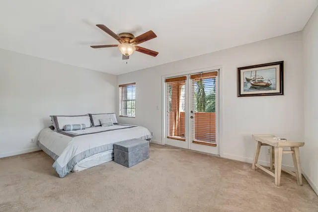 a kitchen with a stove a sink and a refrigerator