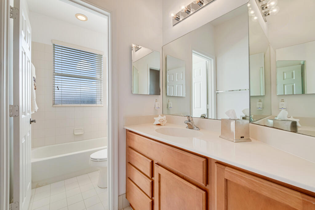514 Cresta Circle West Palm Beach, FL 33413 - Photo 37 of 74 a bathroom with a sink a toilet and shower