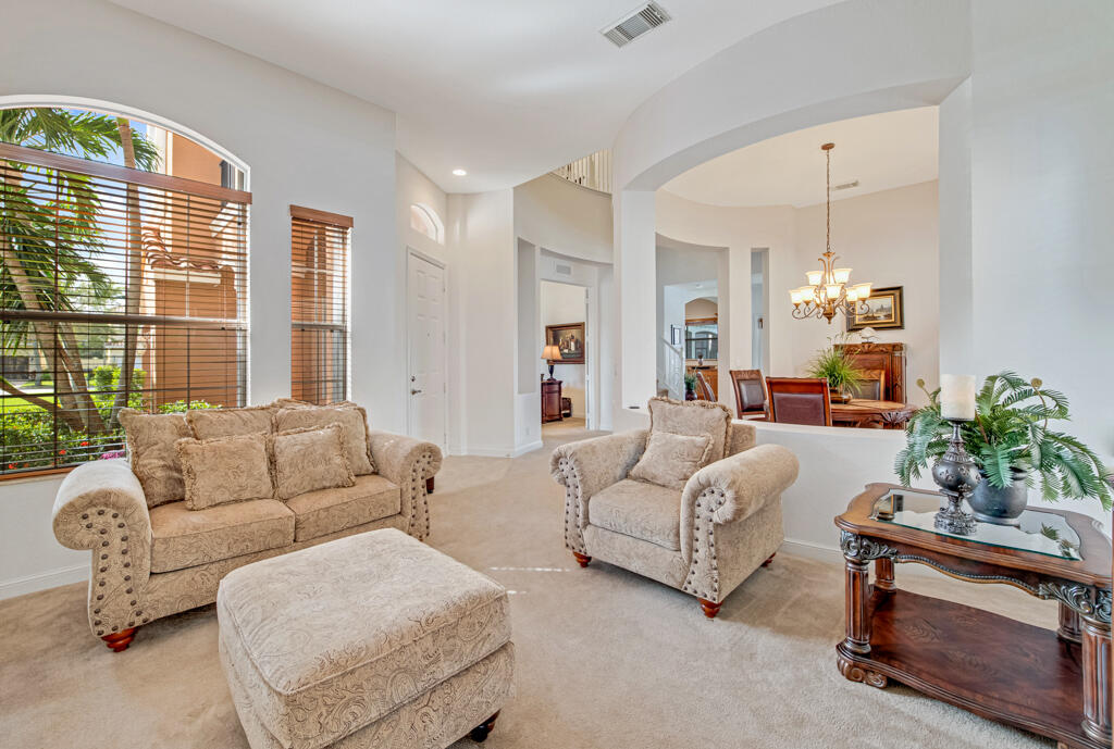 514 Cresta Circle West Palm Beach, FL 33413 - Photo 45 of 74 a living room with furniture and a large window