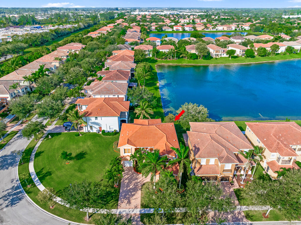 514 Cresta Circle West Palm Beach, FL 33413 - Photo 61 of 74 an aerial view of residential houses with outdoor space and lake view