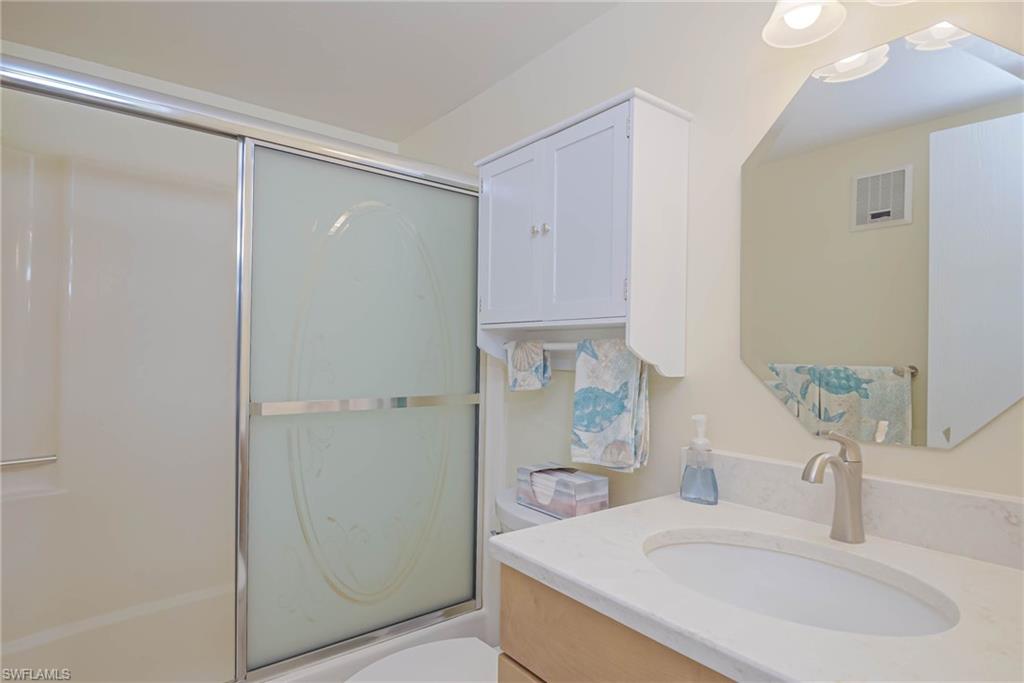 4790 South Cleveland Avenue, Unit 607 Fort Myers, FL 33907 - Photo 12 of 21 a bathroom with a sink and a mirror