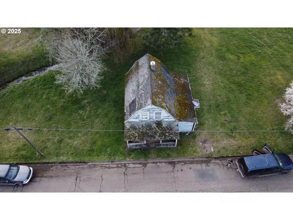 a black and white photo of a house