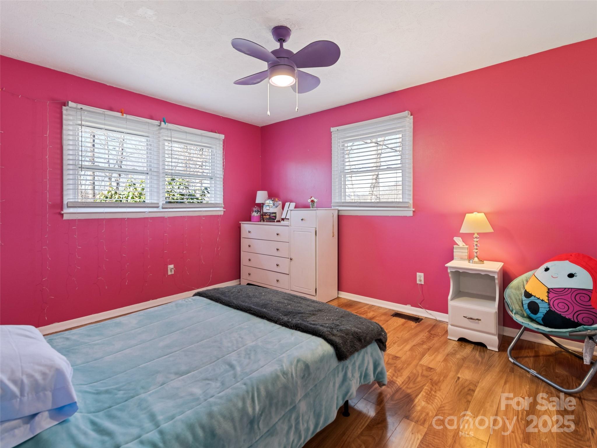 200 Stamey Cove Road Clyde, NC 28721 - Photo 33 of 36 a bedroom with a bed and a window