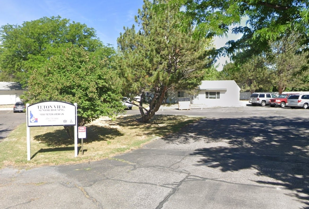 a sign board with parking space