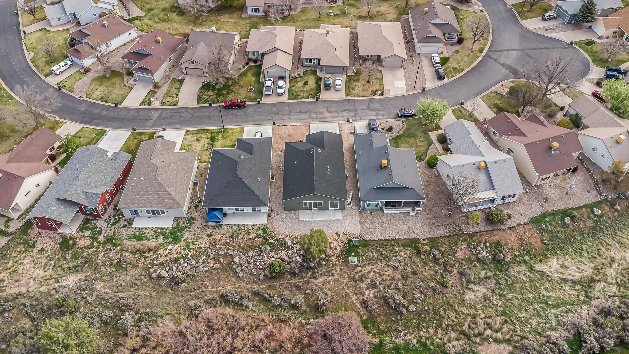 214 Limberpine Circle Parachute, CO 81635 - Photo 20 of 24 an aerial view of a house with a yard
