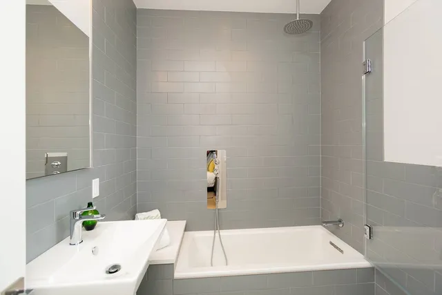 a bathroom with a white tub