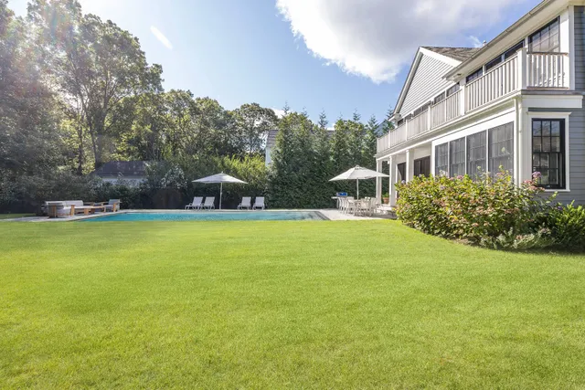 a view of a house with a swimming pool