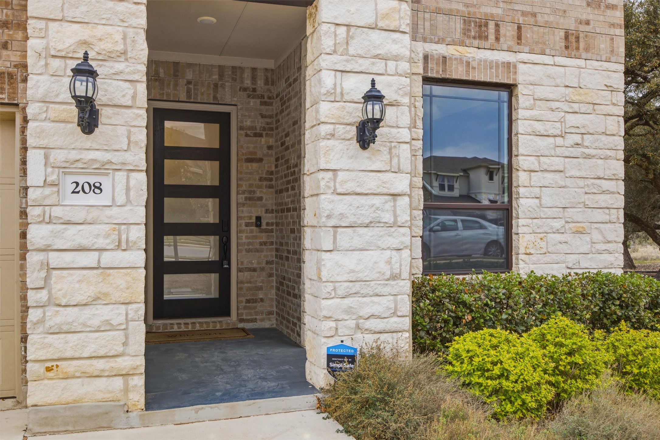 208 Tovas Secret Cove Georgetown, TX 78628 - Photo 3 of 40 a view of a door of the house
