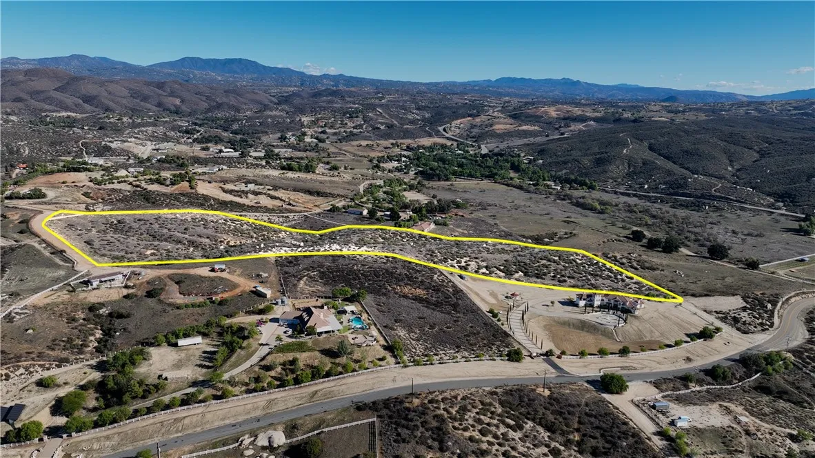 1 Quail Temecula, CA 92592 - Photo 3 of 5 an aerial view of a swimming pool and mountain