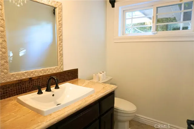 a bathroom with a sink and a toilet