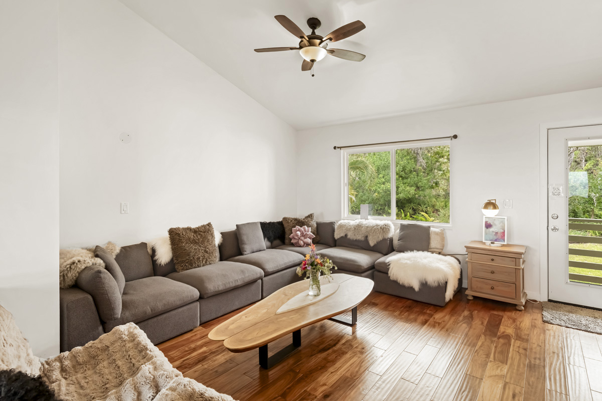 12-1098 Kaimu-Makena Homestead Road Pahoa, HI 96778 - Photo 16 of 29 a living room with furniture and a large window