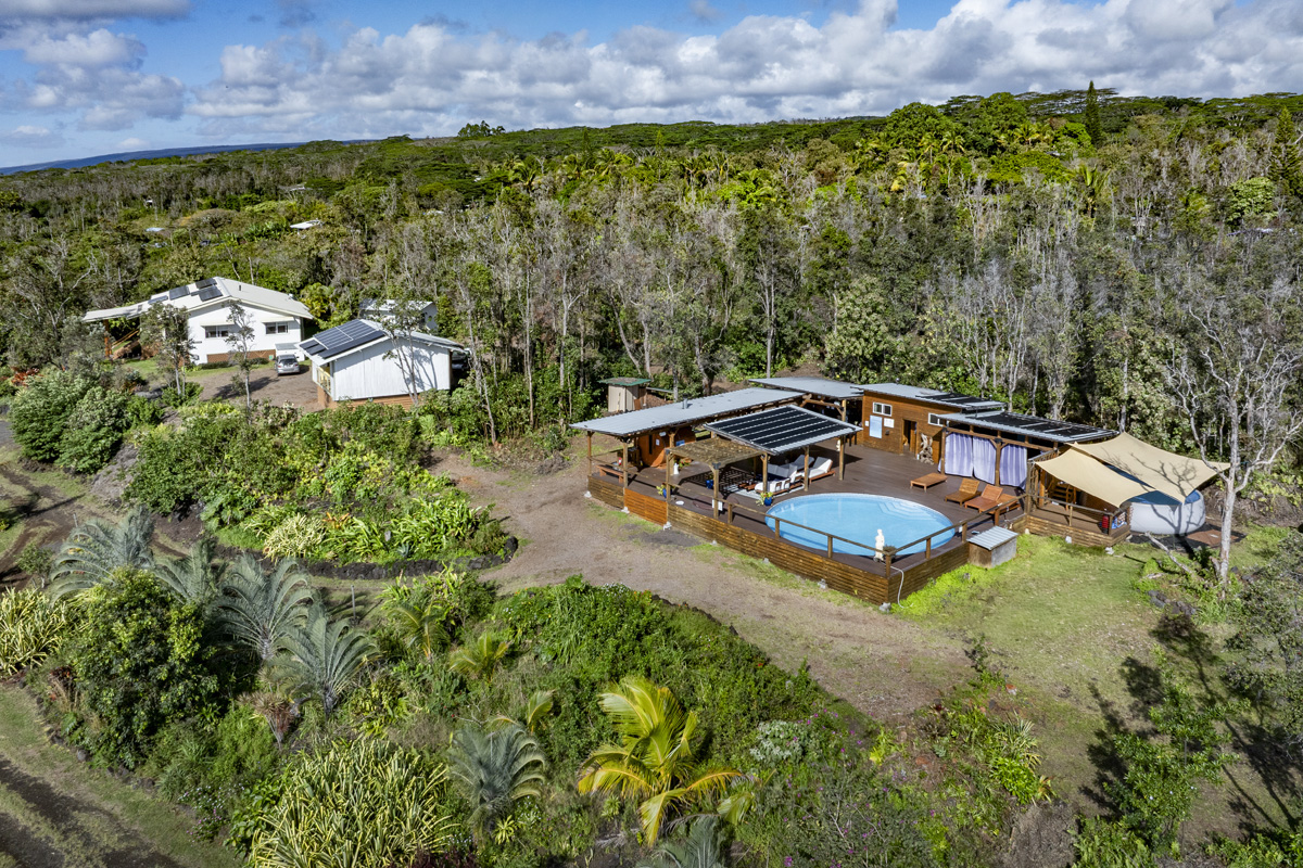12-1098 Kaimu-Makena Homestead Road Pahoa, HI 96778 - Photo 29 of 29 an aerial view of a house with a garden