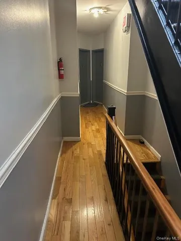 a view of balcony with wooden floor