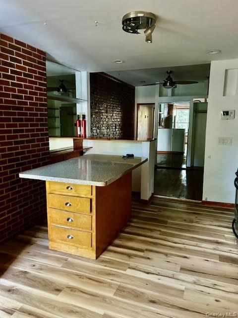 575 Warren Street, Unit 4R Brooklyn, NY 11217 - Photo 6 of 13 a kitchen with stainless steel appliances granite countertop a sink and a stove