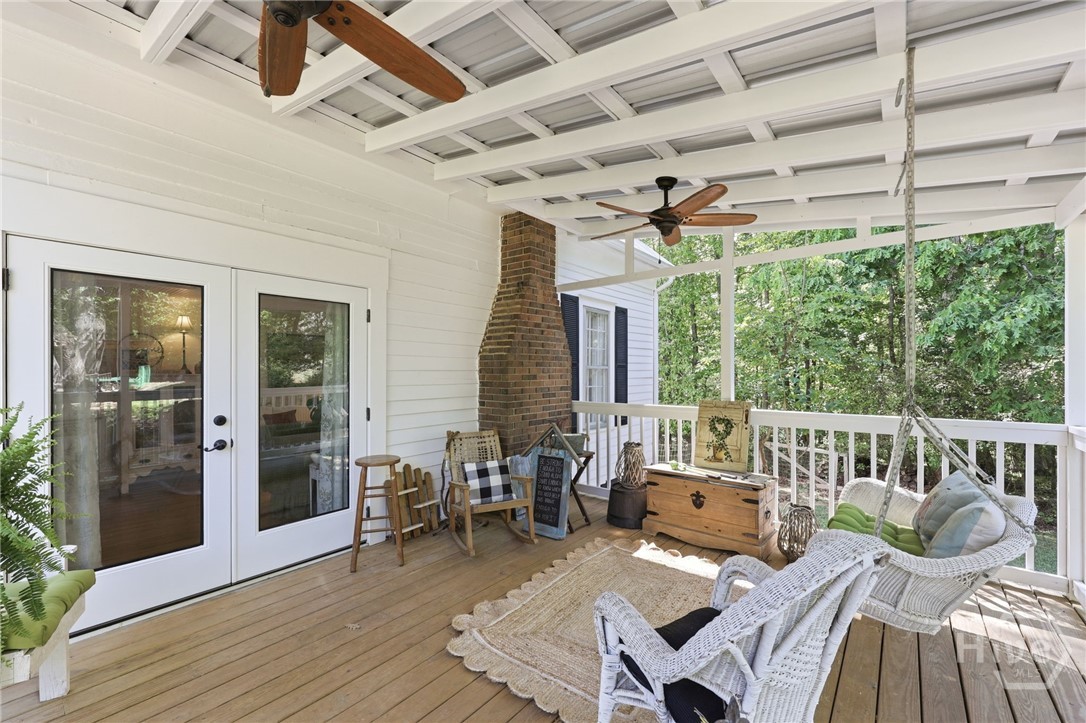 1502 Union Church Road Watkinsville, GA 30677 - Photo 10 of 41 Side Porch off living area with porch swing