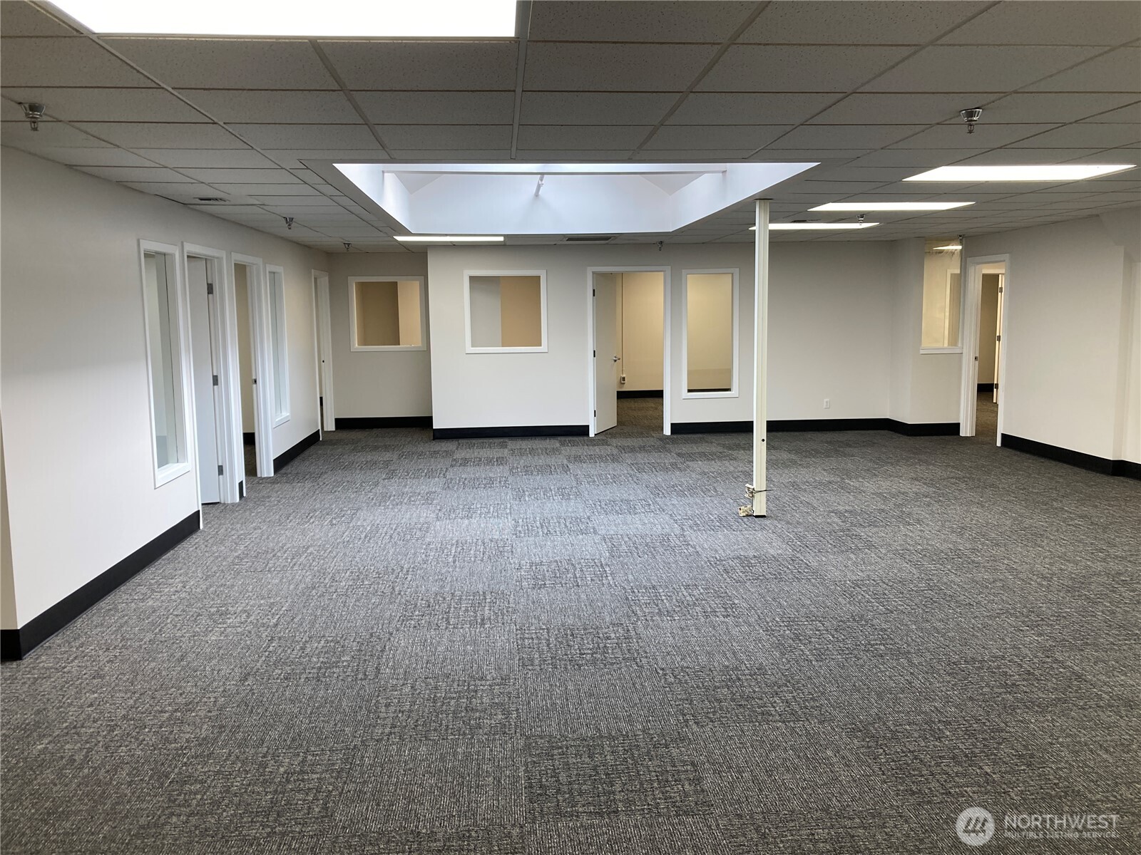 3077 20th Street East, Unit D Fife, WA 98424 - Photo 7 of 9 a view of empty room with ceiling fan