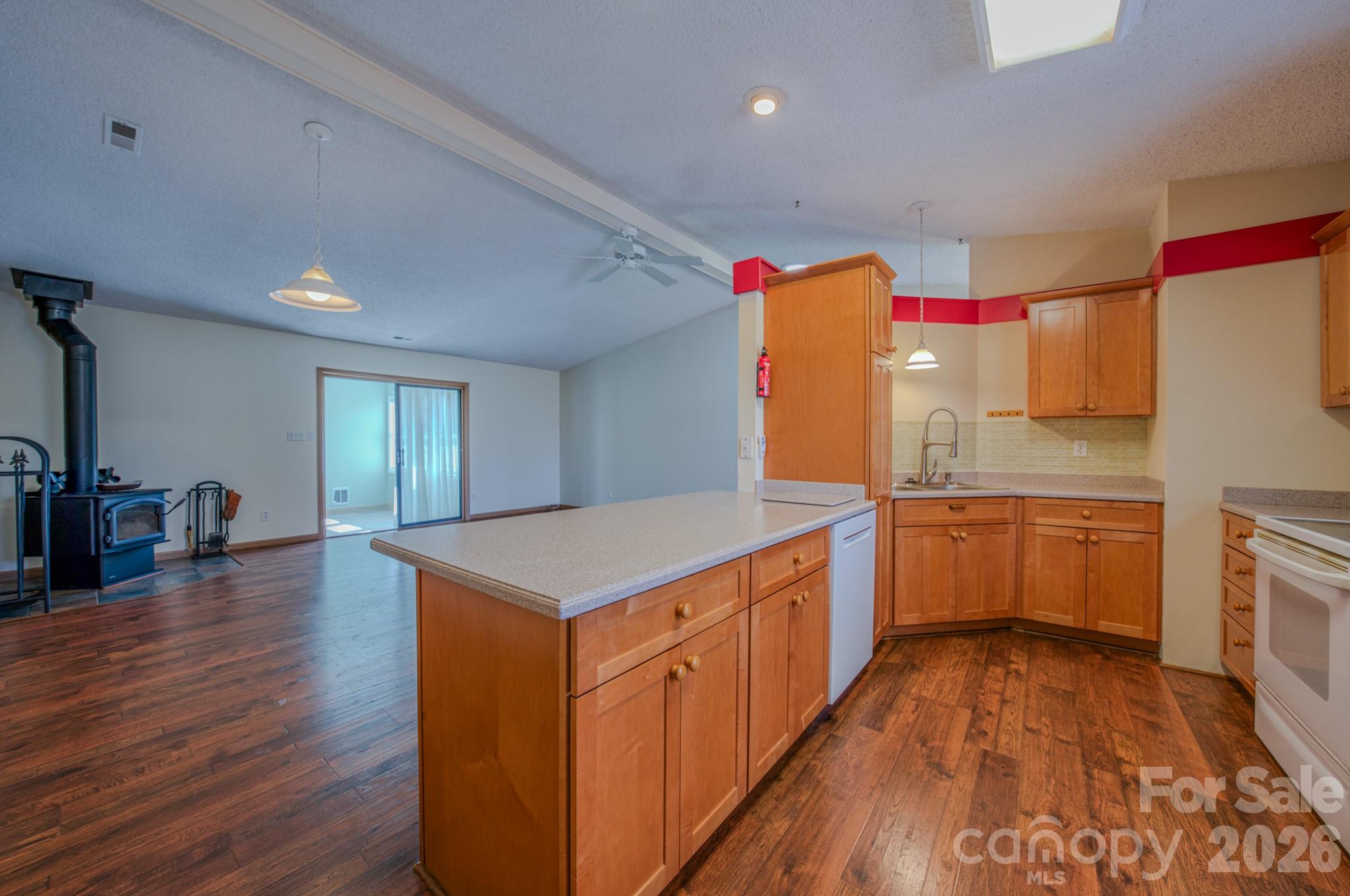 31 Knoll Ridge Drive Asheville, NC 28804 - Photo 14 of 30 a kitchen with cabinets and wooden floor