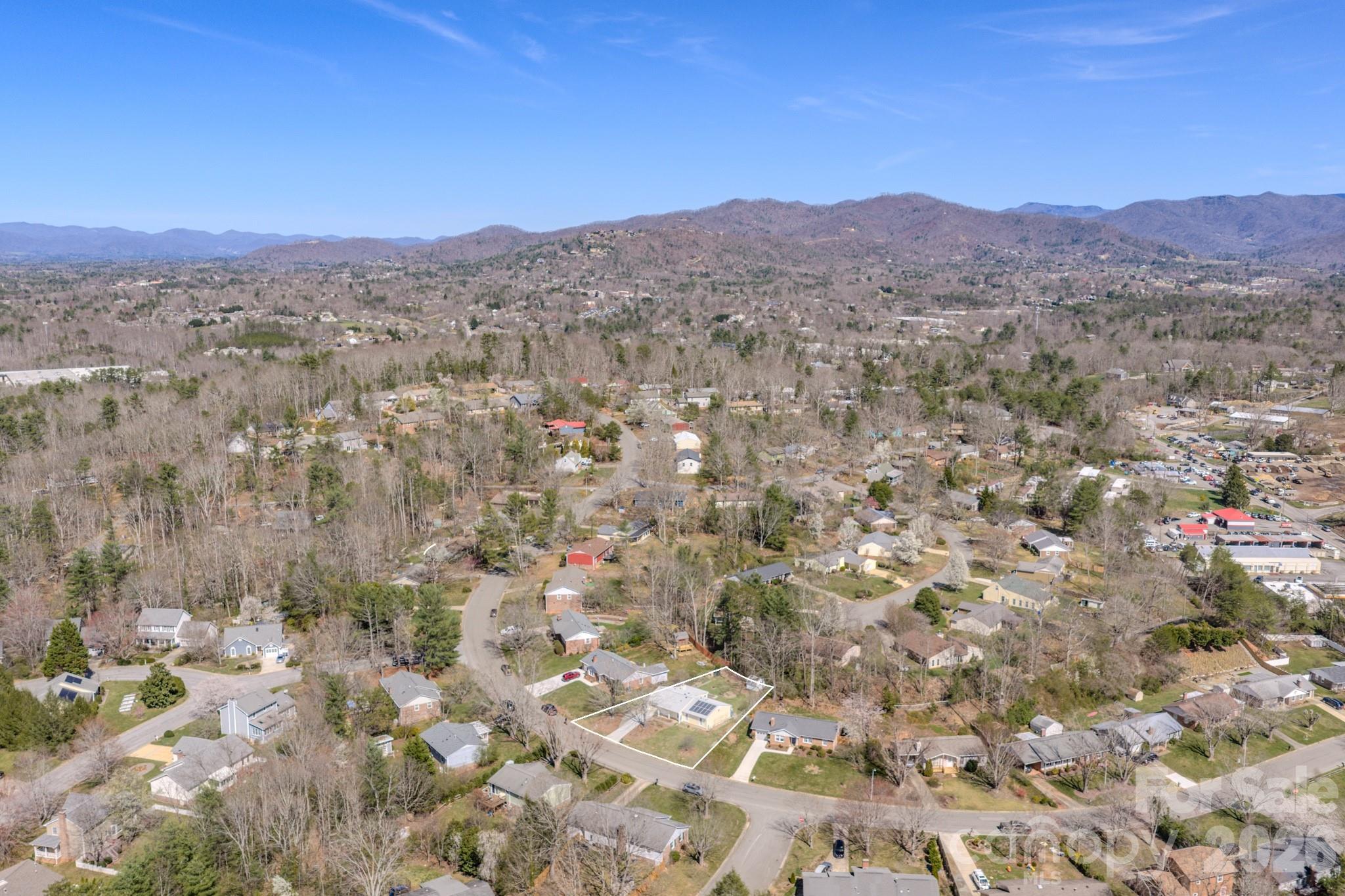 31 Knoll Ridge Drive Asheville, NC 28804 - Photo 25 of 30 a view of a city with mountains in the background