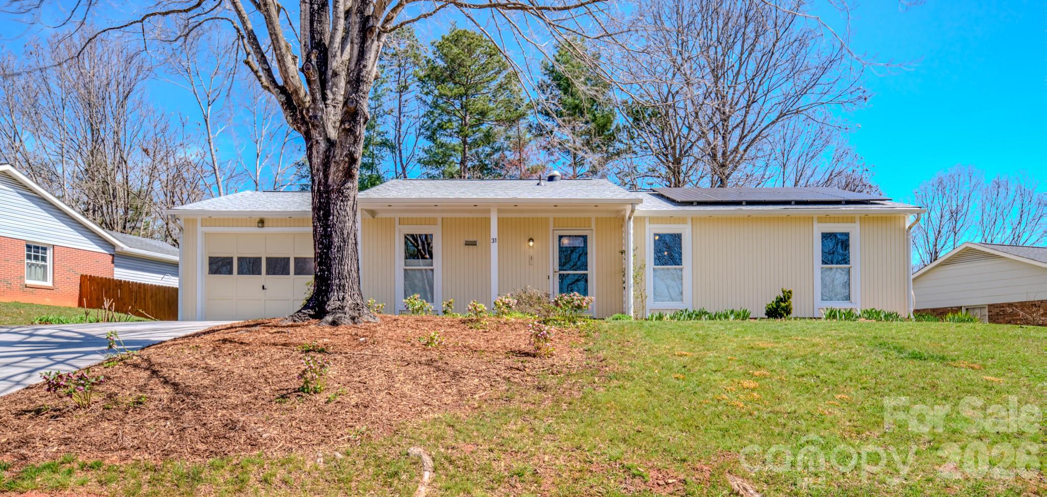 31 Knoll Ridge Drive Asheville, NC 28804 - Photo 30 of 30 a front view of a house with a yard