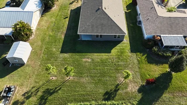 a bathroom with swimming pool and next to a yard