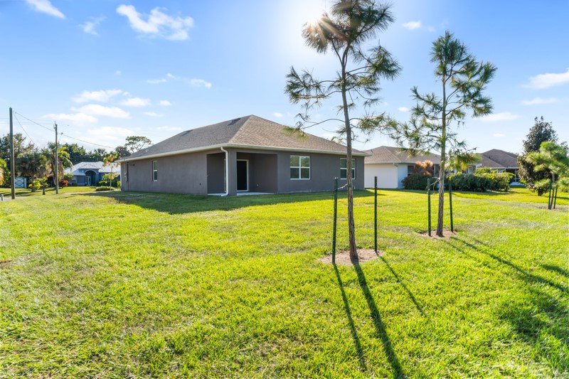 1836 Barber Street Sebastian, FL 32958 - Photo 27 of 29 a view of a house with a swimming pool