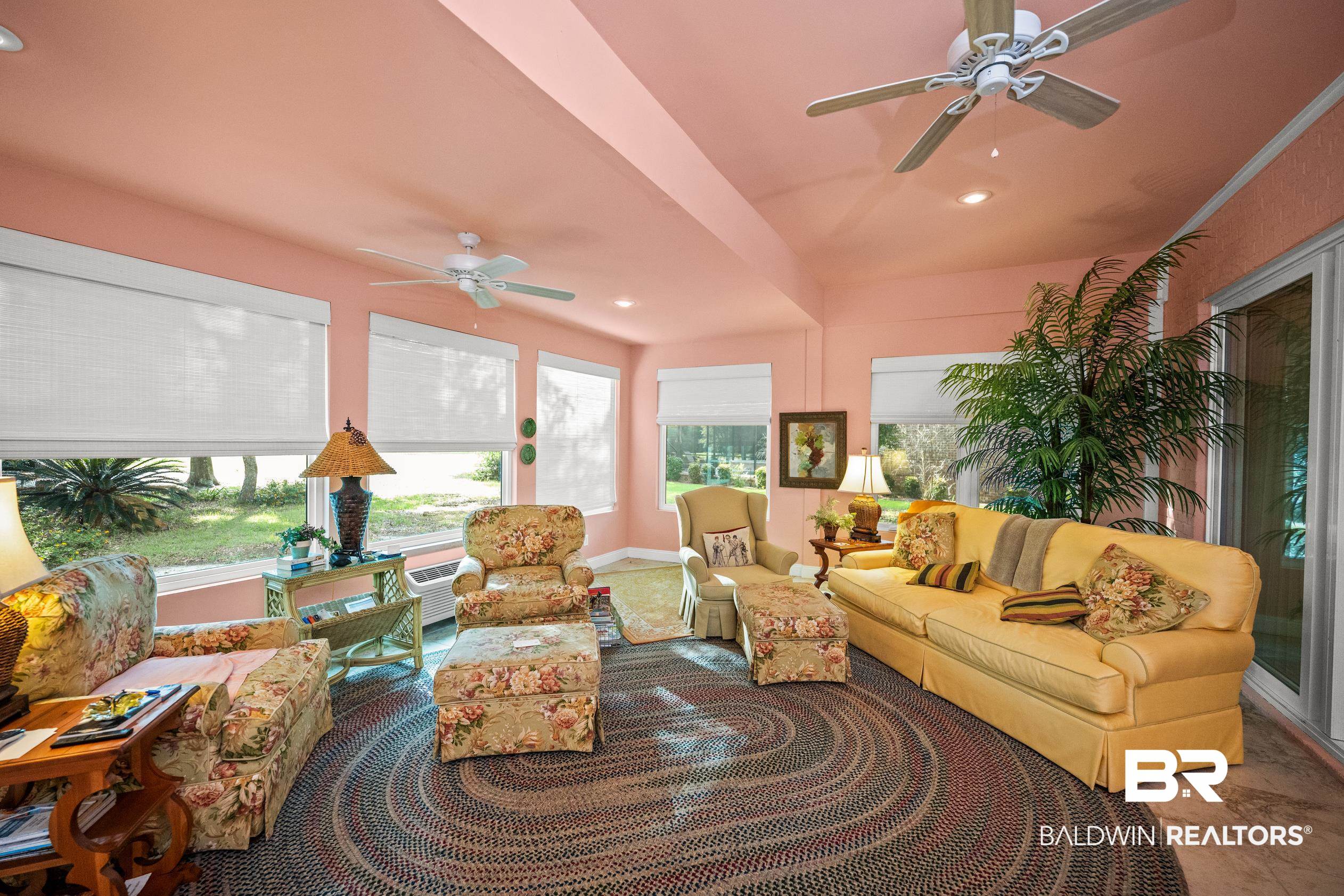 404 Peninsula Boulevard Gulf Shores, AL 36542 - Photo 4 of 51 Living area with recessed lighting and ceiling fan