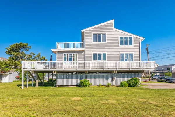 a front view of a house with a porch