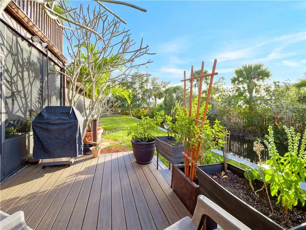 a view of a chairs on the wooden deck