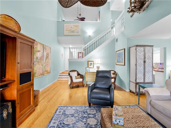 a living room with furniture and a rug