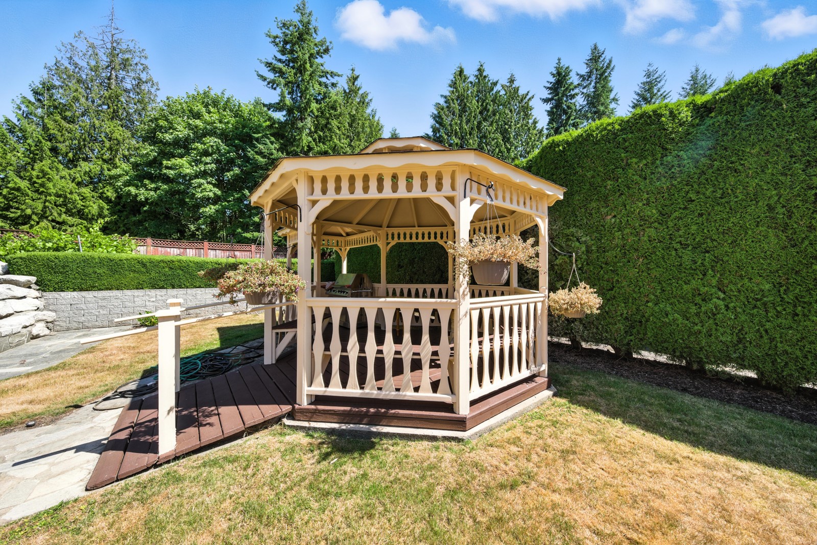 a view of outdoor space with garden and deck